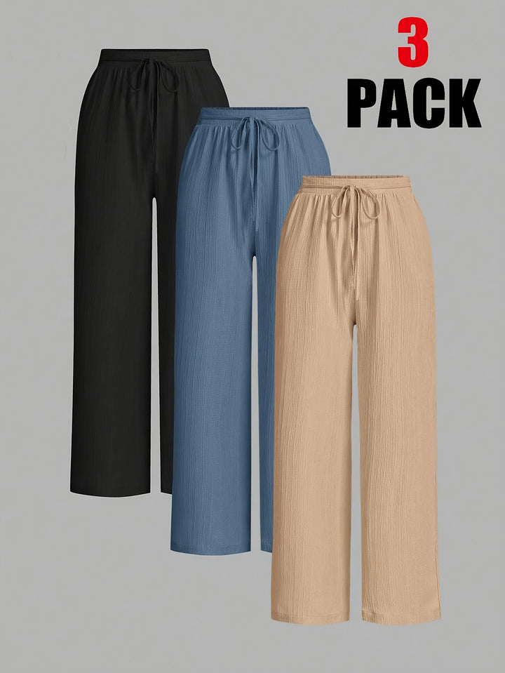3-Pack of comfortable women's trousers in black, blue, and beige for versatile everyday wear