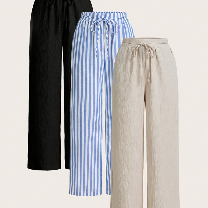 Dandych comfortable women's trousers in black, blue stripes, and beige for versatile styling and comfort