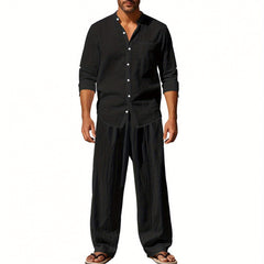 Men's black linen outfit featuring a button-up shirt and loose trousers for effortless style linen clothing