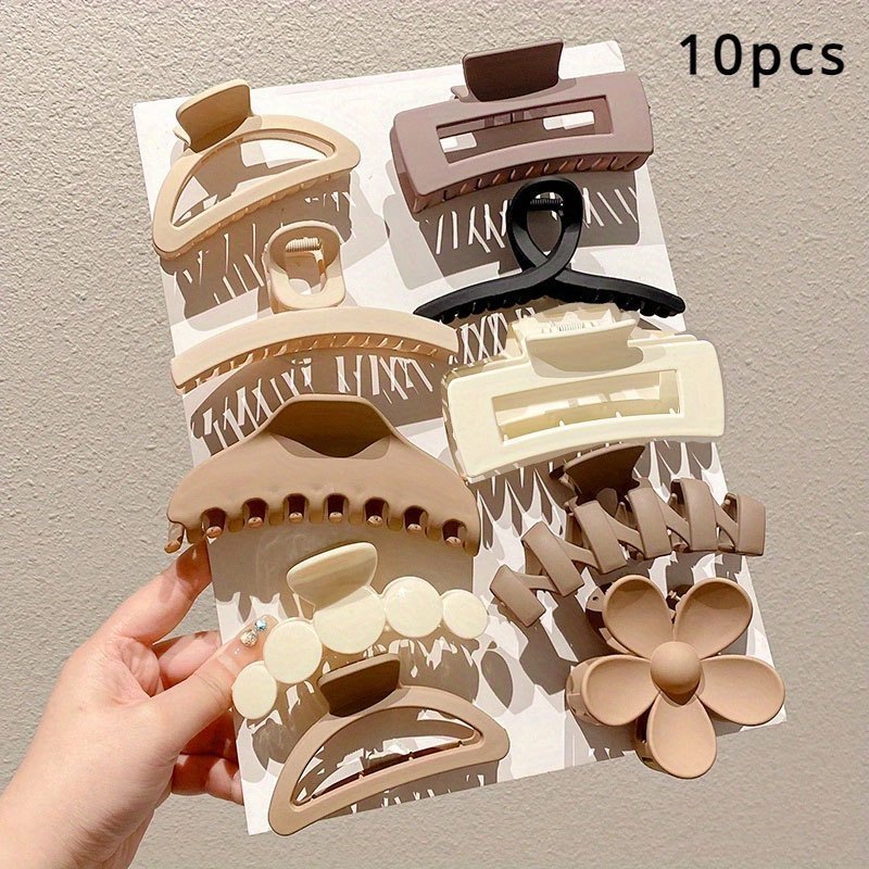 Fashionable claw clips set featuring 10 unique designs in various neutral colors for stylish hair styling