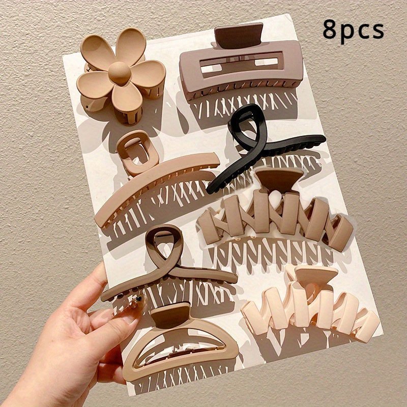 Set of 8 fashionable claw clips in various styles and colors for stylish hair accessories
