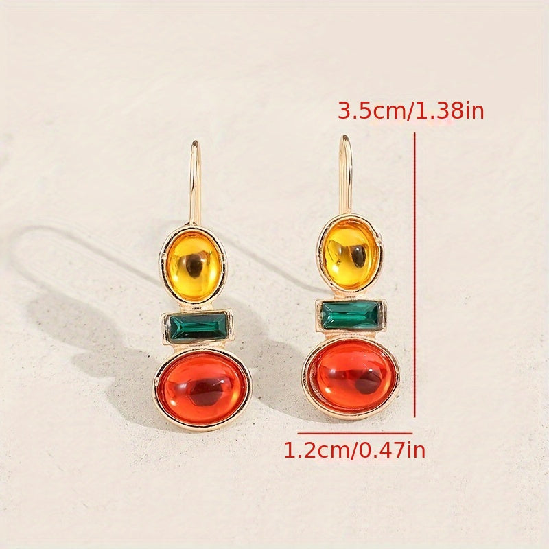 Dandych luxury emerald earrings featuring colorful stones in vibrant design for elegant occasions