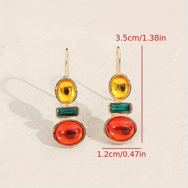 Dandych luxury emerald earrings featuring colorful stones in vibrant design for elegant occasions