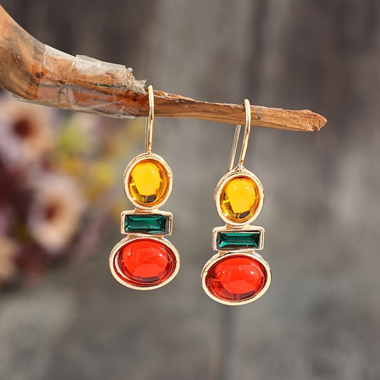 Dandych luxury emerald earrings featuring vibrant multi-colored stones in elegant design