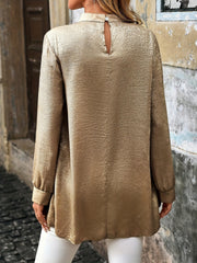 Stylish metallic gold blouse women with a back keyhole detail and long sleeves