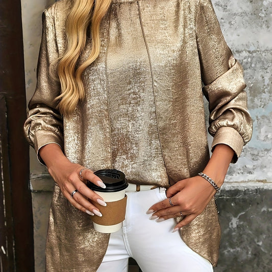 Fashionable metallic gold blouse women with a sleek design, paired with white pants and a coffee cup