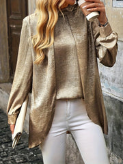 Stylish metallic gold blouse women with long sleeves and a relaxed fit, perfect for casual wear.