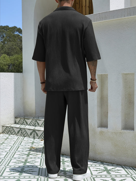 Effortless men's fashion set in dark gray featuring a relaxed shirt and matching pants for a stylish look