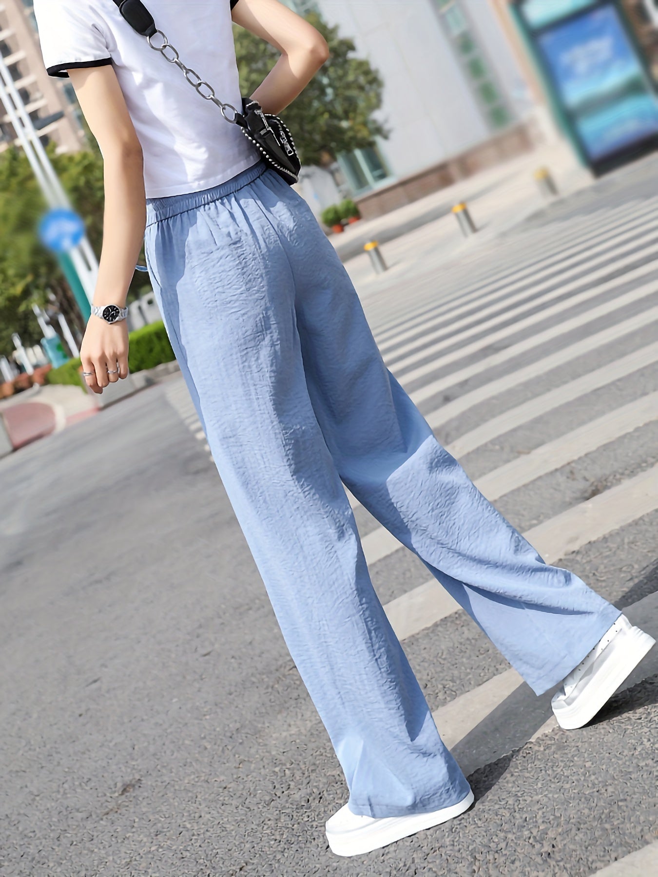 Casual stylish wide leg pants outfit with light blue fabric ideal for summer outings