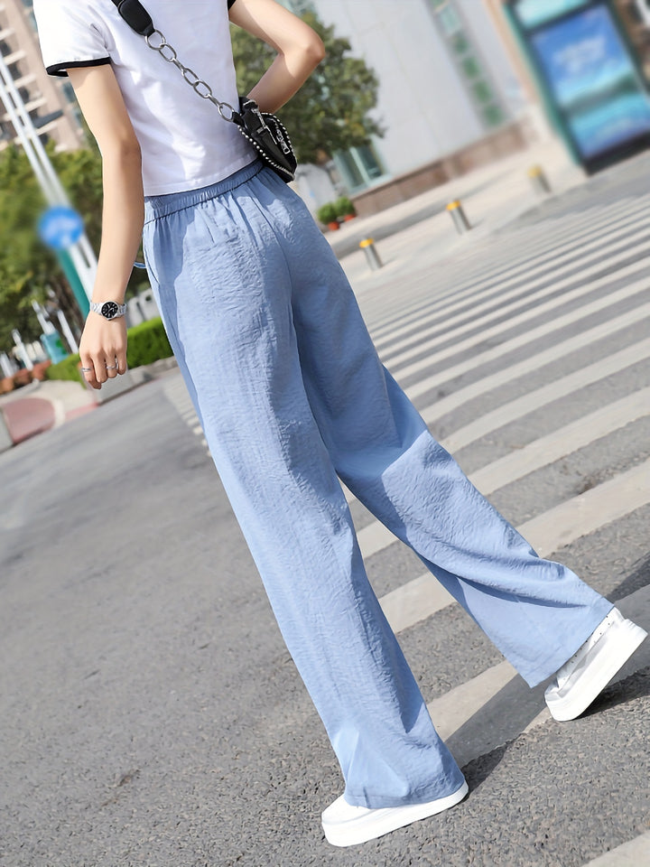 Casual stylish wide leg pants outfit with light blue fabric ideal for summer outings