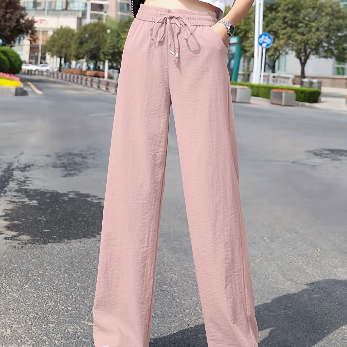 Dandych stylish wide leg pants outfit in soft pink for a trendy casual look
